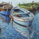 Olio su tela 40x30 cm di Giuseppe Pierozzi, tre barche all’ormeggio in mare calmo, colori azzurri e verde legno barche.