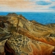 Paesaggio marino livornese dipinto da Alessandro Danzini, scogli di Calafuria e mare modellato dal vento