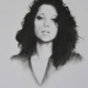 Disegno a grafite e tecnica mista di Davide Robert Ross, su carta con volto femminile contemporanea