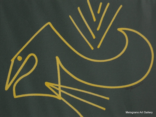 silhouette dorata di un uccello su carta verde scura