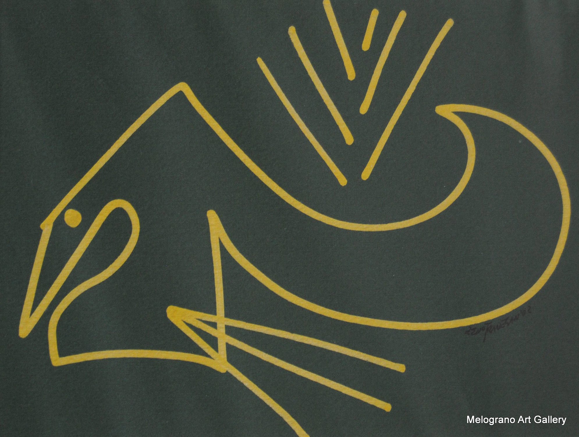 silhouette dorata di un uccello su carta verde scura