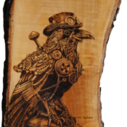 Paola Bertini, Il Corvo Steampunk, pirografia su legno di olivo, 2025